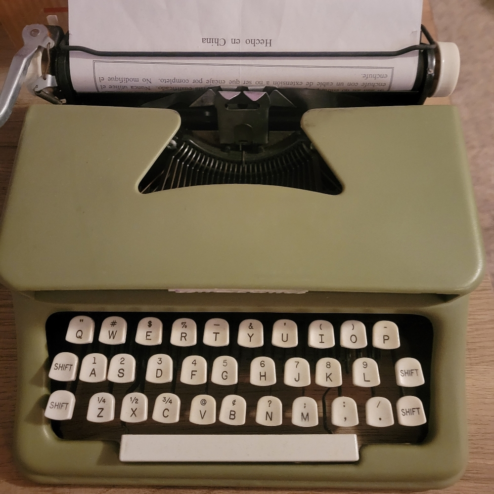 Brand: Tom Thumb; Size: kids; Color: pale green with white keys